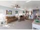 Open living space with leather sofas and views into the dining and kitchen areas at 8409 Placida Rd # 308, Placida, FL 33946