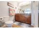 Double vanity bathroom with granite countertop at 8409 Placida Rd # 308, Placida, FL 33946