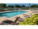Refreshing community pool with ample lounge chairs for relaxation at 13524 Abercrombie Dr, Englewood, FL 34223