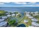 Breathtaking aerial view showcasing waterfront homes, a private harbor, and ocean access at 11000 Placida Rd # 2502, Placida, FL 33946