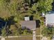 A bird's-eye view captures the layout of the home and its well-manicured surroundings at 6517 Kenwood Dr, North Port, FL 34287