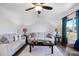 Cozy living room featuring neutral decor, stylish lamps, and comfortable seating at 6517 Kenwood Dr, North Port, FL 34287