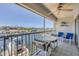 Scenic balcony with water views, outdoor seating, and a ceiling fan at 7070 Placida Rd # 1221, Placida, FL 33946