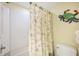 Bathroom with shower, seashell theme, and a nautical crab decoration at 7070 Placida Rd # 1221, Placida, FL 33946