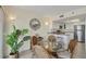 Dining area with glass-top table and wicker chairs at 7070 Placida Rd # 1221, Placida, FL 33946
