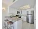 Well-equipped kitchen with stainless steel appliances and granite countertops at 7070 Placida Rd # 1221, Placida, FL 33946