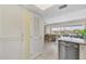 Kitchen features granite counters, stainless steel appliances, and living room view at 7070 Placida Rd # 1221, Placida, FL 33946
