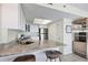 Kitchen boasts granite countertops, stainless steel appliances, and breakfast bar at 7070 Placida Rd # 1221, Placida, FL 33946
