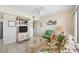 Living area with wicker furniture and a view into the kitchen at 7070 Placida Rd # 1221, Placida, FL 33946