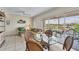 Bright living room with water views, featuring comfortable seating and a dining area at 7070 Placida Rd # 1221, Placida, FL 33946