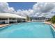 Inviting community pool with a large patio area at 7070 Placida Rd # 1221, Placida, FL 33946