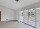 Sunroom with sliding glass doors and view of backyard at 189 Bunker Rd, Rotonda West, FL 33947