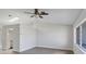 Bright living room featuring hardwood floors and a large window at 189 Bunker Rd, Rotonda West, FL 33947