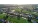 Bird's-eye view of a residential area with lush landscaping and waterways at 189 Bunker Rd, Rotonda West, FL 33947