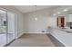 Bright dining room with hardwood floors and access to patio at 189 Bunker Rd, Rotonda West, FL 33947