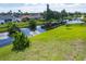 Aerial view of canal and neighborhood at 189 Bunker Rd, Rotonda West, FL 33947