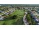Aerial view of golf course and surrounding homes at 189 Bunker Rd, Rotonda West, FL 33947