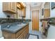 Bathroom with vanity and wood cabinets at 1867 Neptune Dr, Englewood, FL 34223