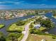 Waterfront property with canal access and neighboring homes at 1867 Neptune Dr, Englewood, FL 34223