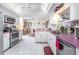 Modern kitchen with stainless steel appliances and white cabinets at 1867 Neptune Dr, Englewood, FL 34223