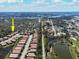 Expansive aerial view of the community showcases the neighborhood layout and the proximity to surrounding lakes at 1012 Bradberry Dr, Nokomis, FL 34275