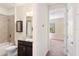Bathroom featuring a shower-tub combo and a vanity with marble countertop at 1012 Bradberry Dr, Nokomis, FL 34275