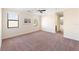 Carpeted bonus room with windows and recessed lighting at 1012 Bradberry Dr, Nokomis, FL 34275