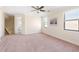 Spacious carpeted bonus room with two large windows offering great natural light at 1012 Bradberry Dr, Nokomis, FL 34275