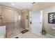 Large bathroom with walk-in shower, tile flooring and modern fixtures at 14089 Newson Ln, Port Charlotte, FL 33981