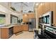Kitchen with stainless steel appliances and ample wood cabinetry at 14089 Newson Ln, Port Charlotte, FL 33981