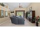 Living room showcasing a sectional sofa and entertainment center at 14089 Newson Ln, Port Charlotte, FL 33981
