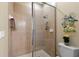 Large walk-in shower with glass enclosure and stylish tile at 14089 Newson Ln, Port Charlotte, FL 33981