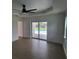 Bedroom offers a view of the backyard and swimming pool at 261 Broadmoor Ln, Rotonda West, FL 33947