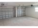Spacious two-car garage with auto-opener at 261 Broadmoor Ln, Rotonda West, FL 33947