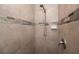 Shower stall with tile surround and modern fixtures at 10236 Willmington Blvd, Englewood, FL 34224