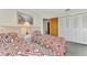 Guest bedroom with two twin beds and ample closet space at 6 Quails Run Blvd # 7, Englewood, FL 34223