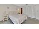 Bedroom with double bed and built in closet at 6 Quails Run Blvd # 7, Englewood, FL 34223