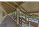 Building exterior with hallway and parking lot at 6 Quails Run Blvd # 7, Englewood, FL 34223