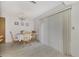 Bright dining area with sliding doors leading to the outdoors at 6 Quails Run Blvd # 7, Englewood, FL 34223