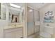 Bathroom with shower, toilet, and vanity at 6 Quails Run Blvd # 7, Englewood, FL 34223