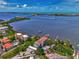 Aerial view showcasing waterfront location and building at 53 W Bay Heights Rd # 205, Englewood, FL 34223