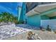 Community patio area with decorative landscaping at 53 W Bay Heights Rd # 205, Englewood, FL 34223