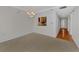Dining room with carpeted floors and kitchen pass-through at 53 W Bay Heights Rd # 205, Englewood, FL 34223