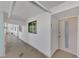 Building hallway with light walls and a door to unit 205 at 53 W Bay Heights Rd # 205, Englewood, FL 34223