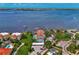 Wide aerial view of waterfront property with boat slips at 53 W Bay Heights Rd # 205, Englewood, FL 34223