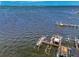 Aerial view of waterfront property with private boat docks at 53 W Bay Heights Rd # 205, Englewood, FL 34223
