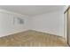 Bright bedroom with neutral carpeting at 53 W Bay Heights Rd # 205, Englewood, FL 34223