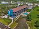Aerial view of waterfront building and pool at 53 W Bay Heights Rd # 205, Englewood, FL 34223
