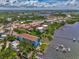 Aerial view of waterfront property and surrounding area at 53 W Bay Heights Rd # 205, Englewood, FL 34223
