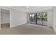 Spacious bedroom with access to a balcony at 53 W Bay Heights Rd # 205, Englewood, FL 34223